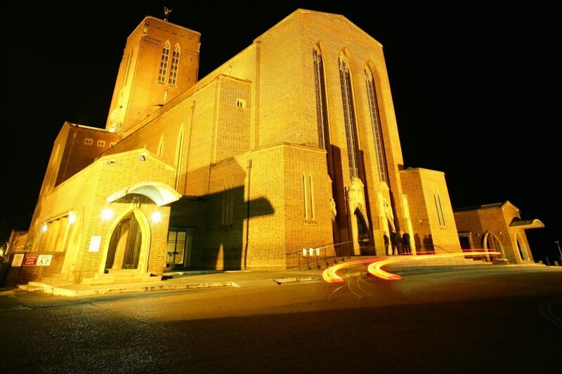 cathedral lit gold at night