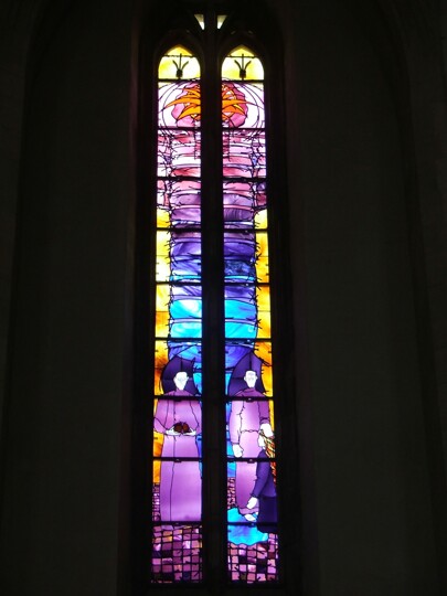 Photograph of a colourful stainded glass window called 